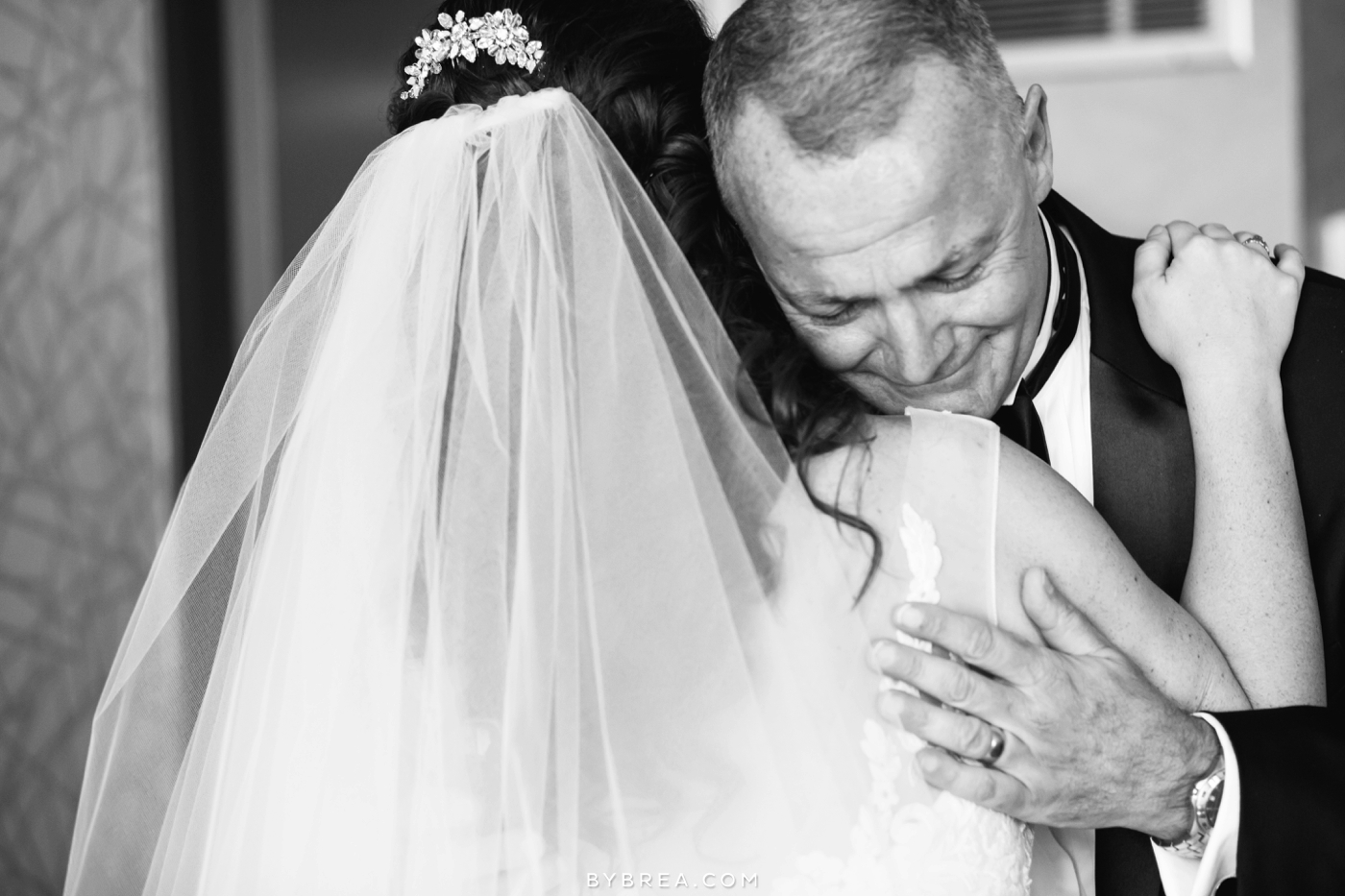 Baltimore wedding photo father hugging the bride