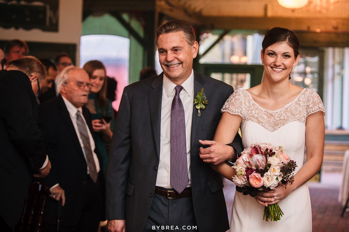 Vandiver Inn wedding smiling bride escorted down the aisle