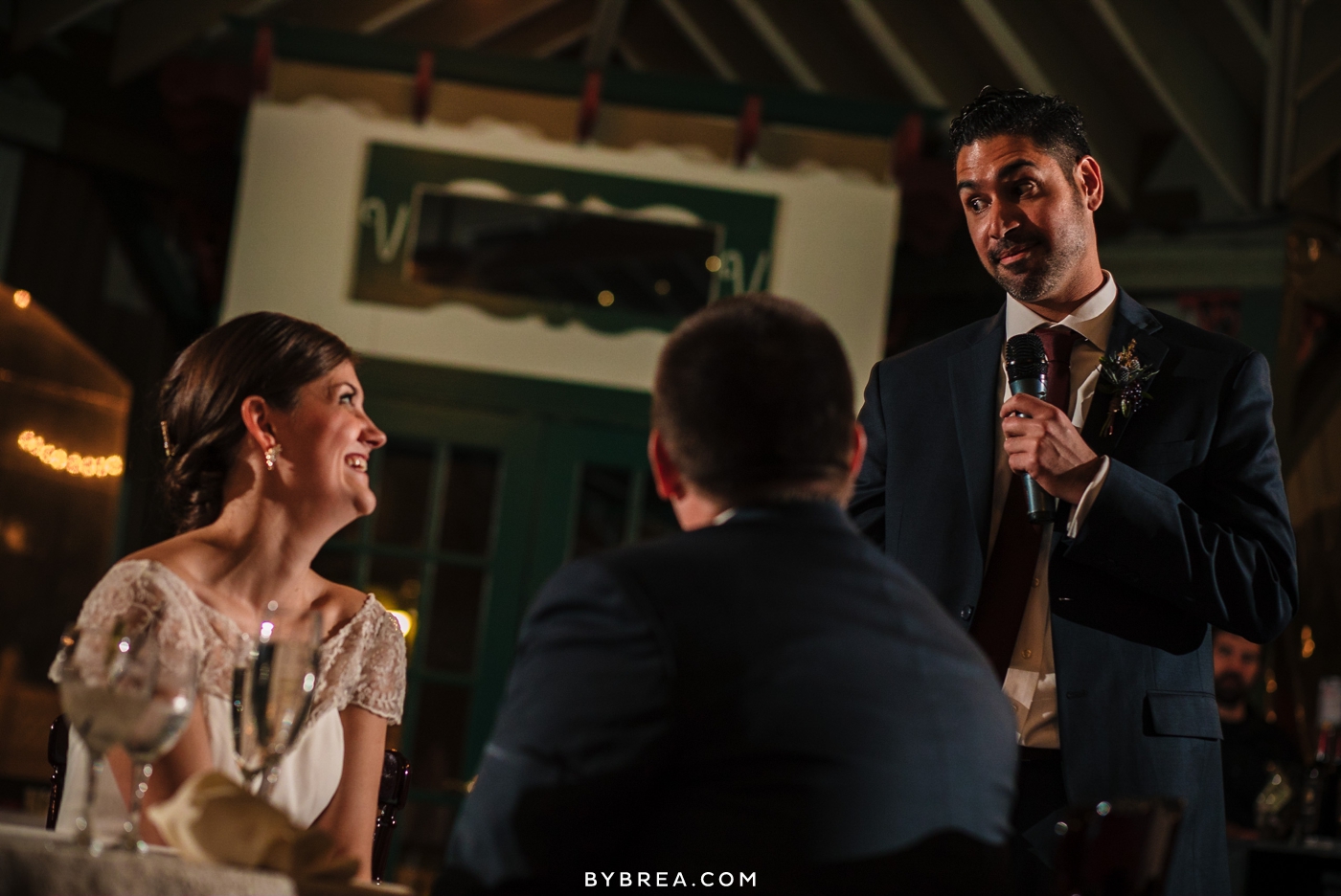 Vandiver Inn bride smiling at the best man giving speech