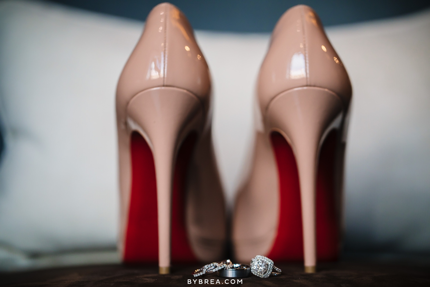 Hotel at Arundel Preserve wedding detail photo Louboutins with rings