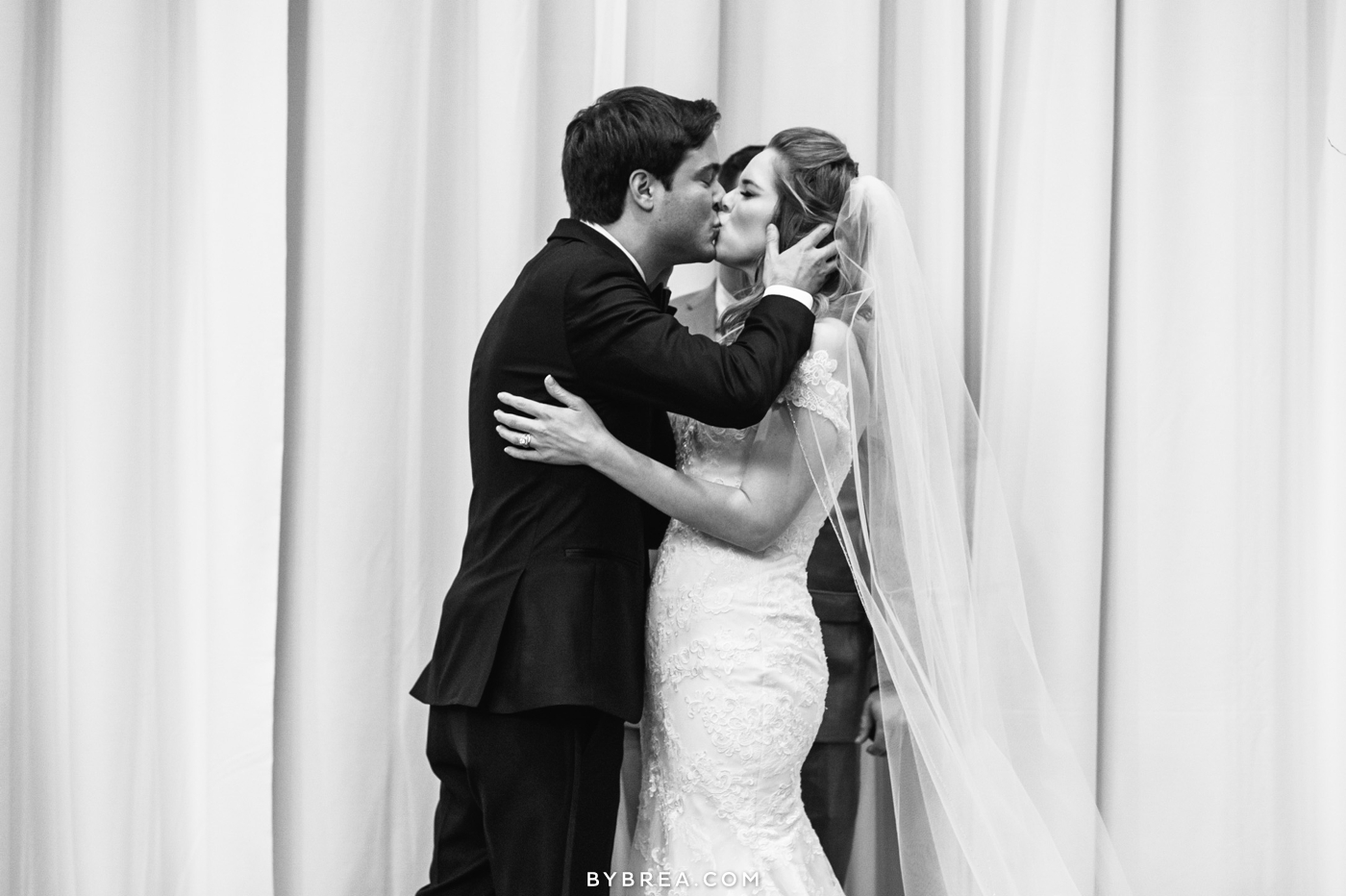 Hotel at Arundel Preserve wedding photo ceremony bride and groom first kiss