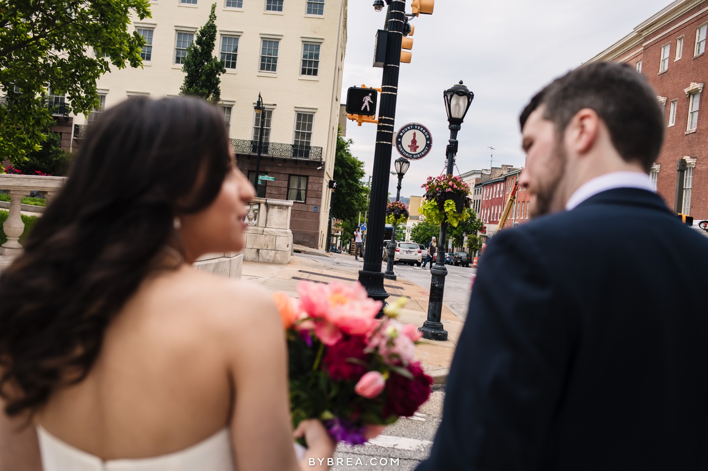 George Peabody Library wedding photo bride and groom with walk sign on street