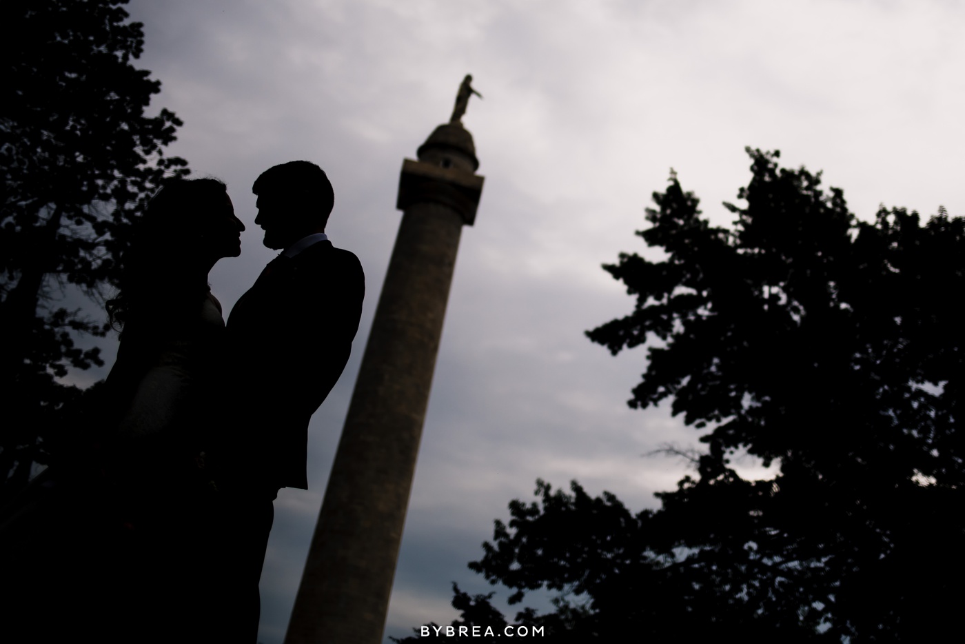 Baltimore wedding photo couple silhouette by statue