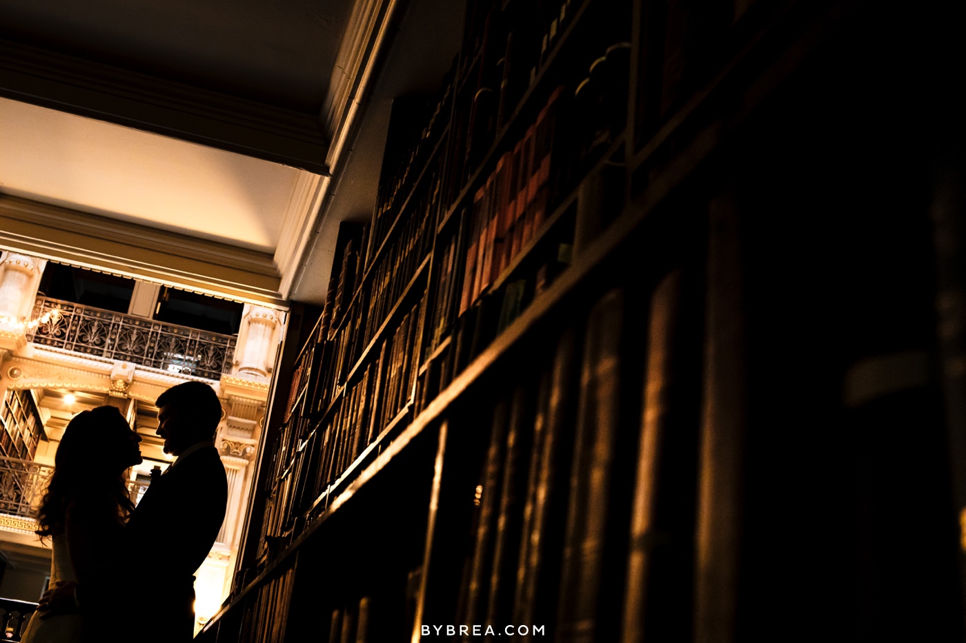 George Peabody Library wedding photo couple silhouette among books