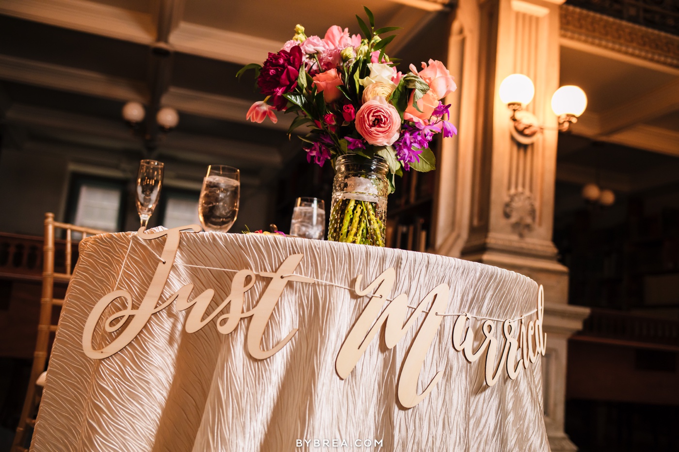 George Peabody Library wedding photo Just Married sign bouquet by The Floral Studio