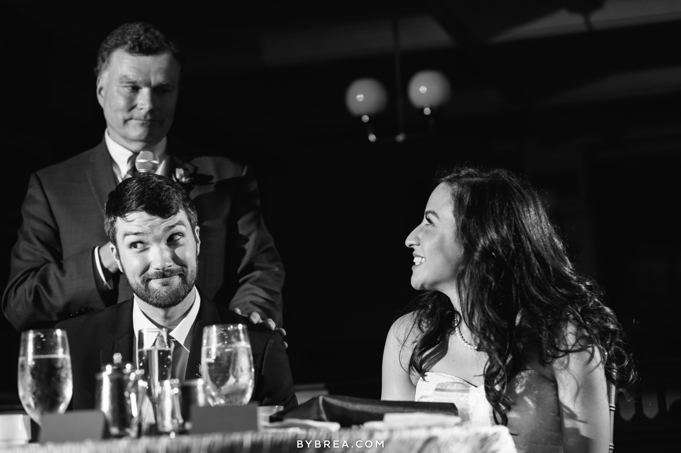 George Peabody Library wedding photo groom looks skeptical during family member speech