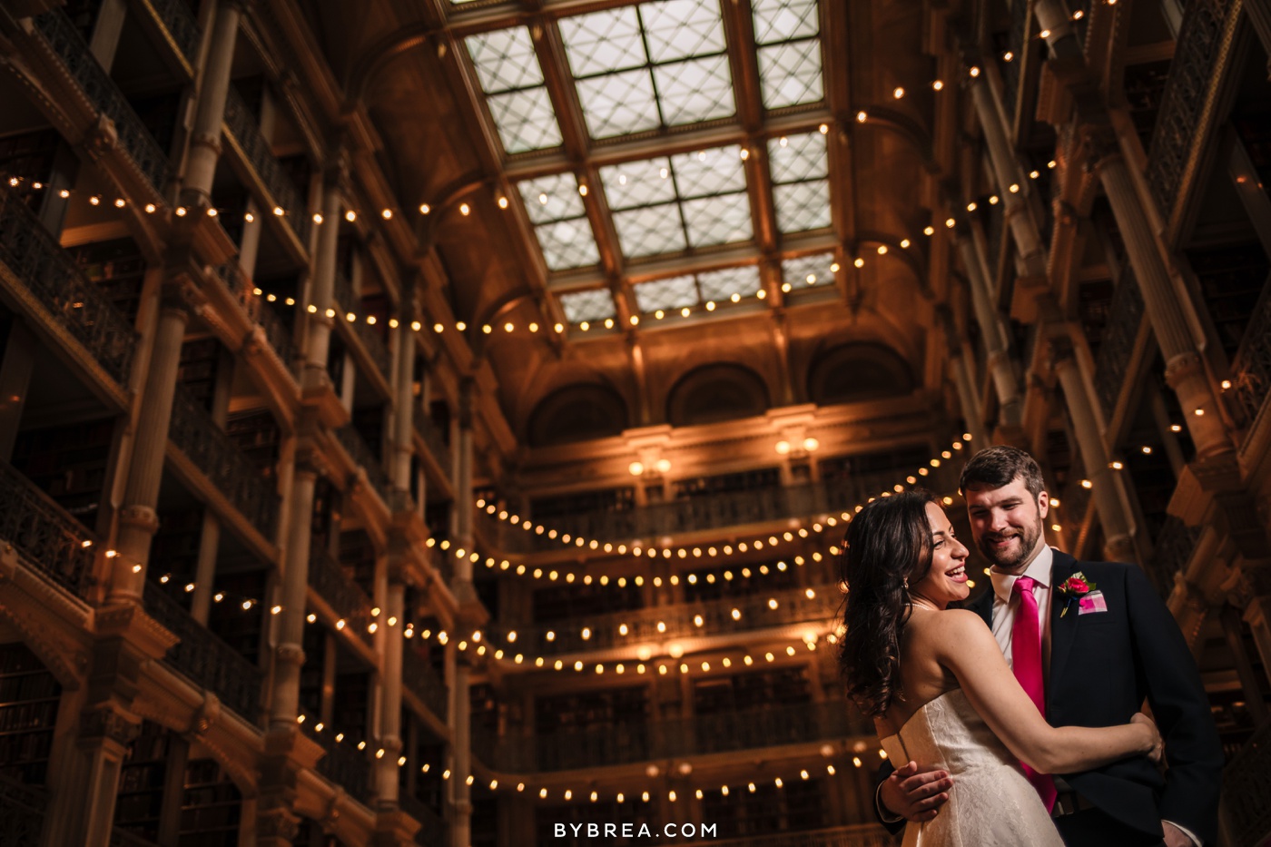 George Peabody Library wedding photo bride and groom dancing in main hall