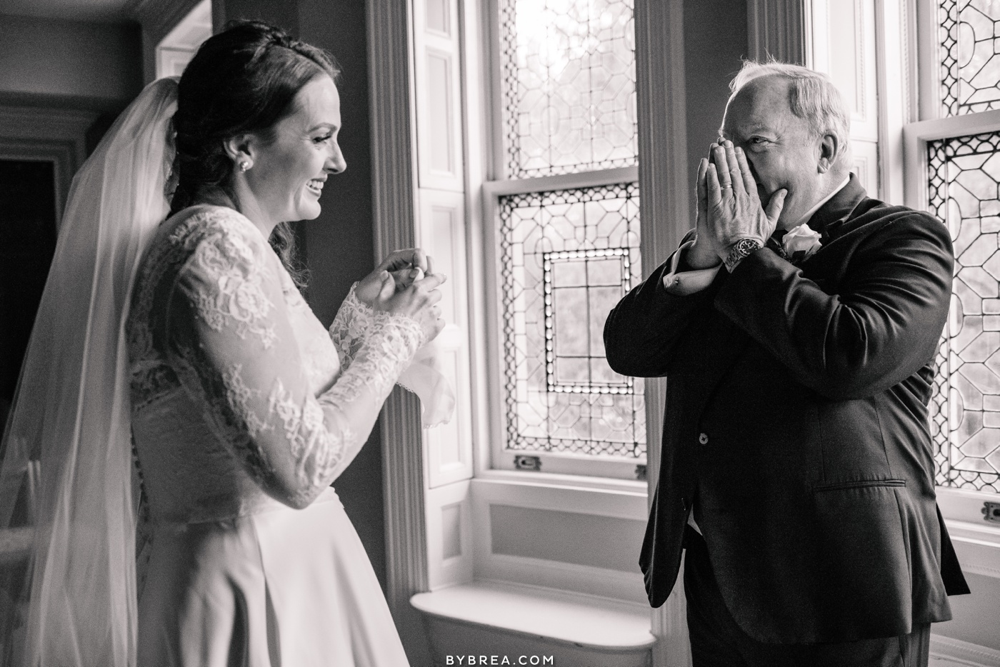 Candid photo of dad seeing her daughter in her dress during wedding at Engineer's Club Baltimore wedding photography