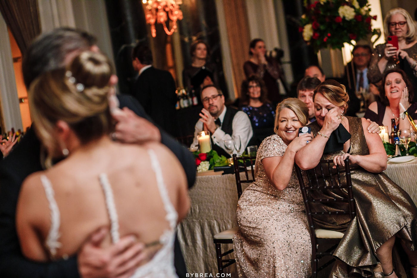 Emotional photo of mom crying during parent dances at Belvedere wedding