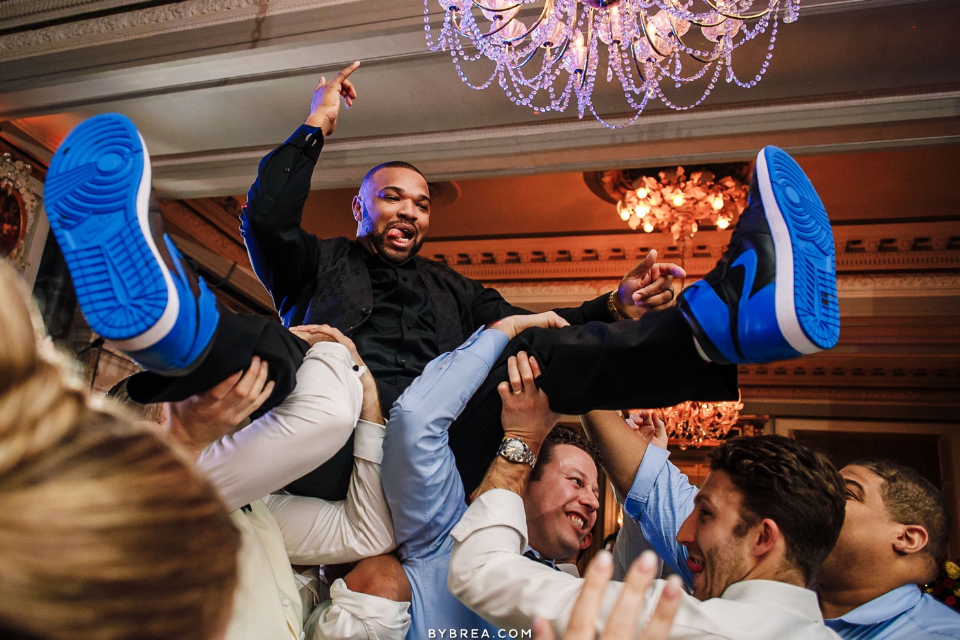 Candid moment of groom during ceremony at Belvedere Hotel in Baltimore 