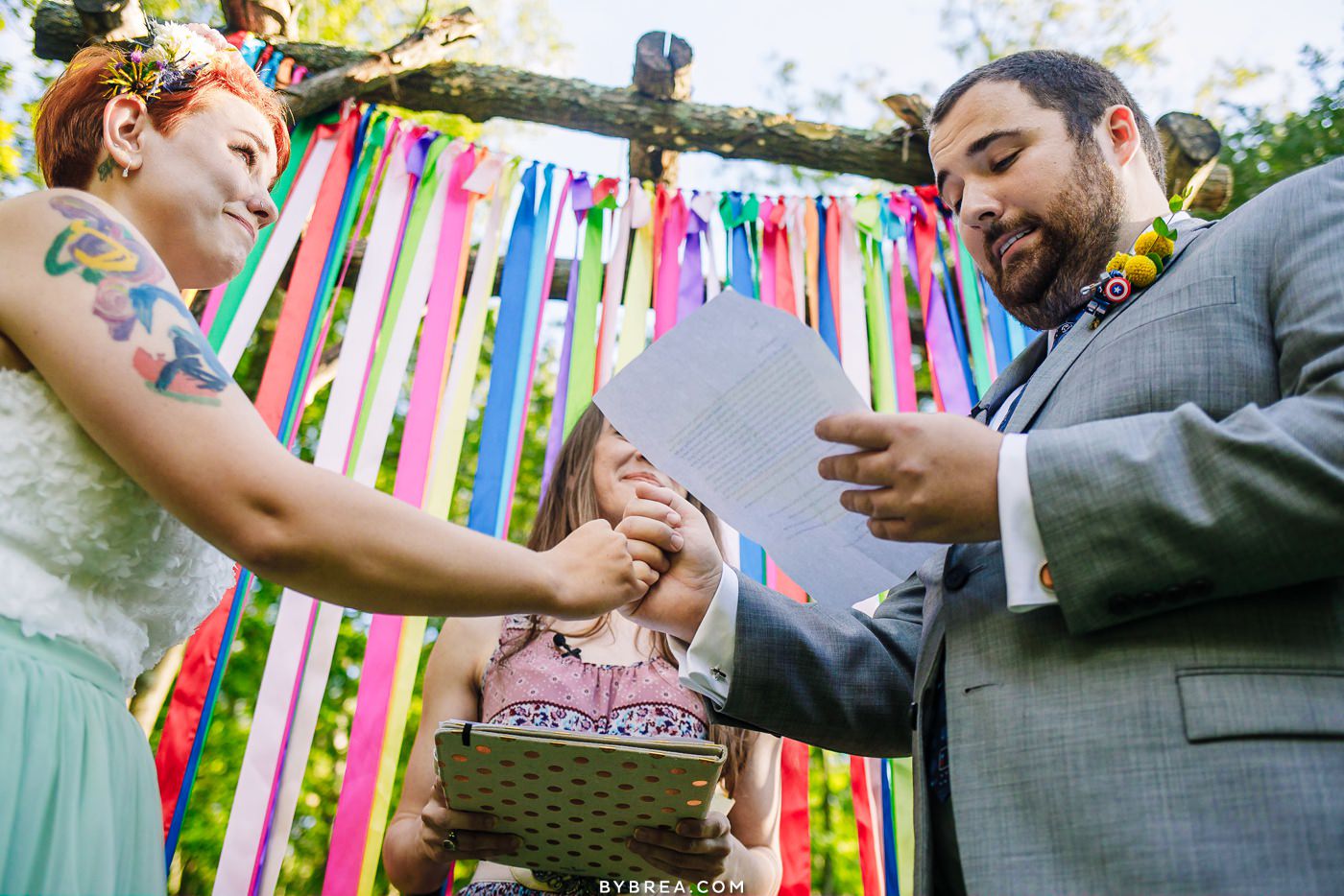 Pinky promise wedding photo at Caboose Farm